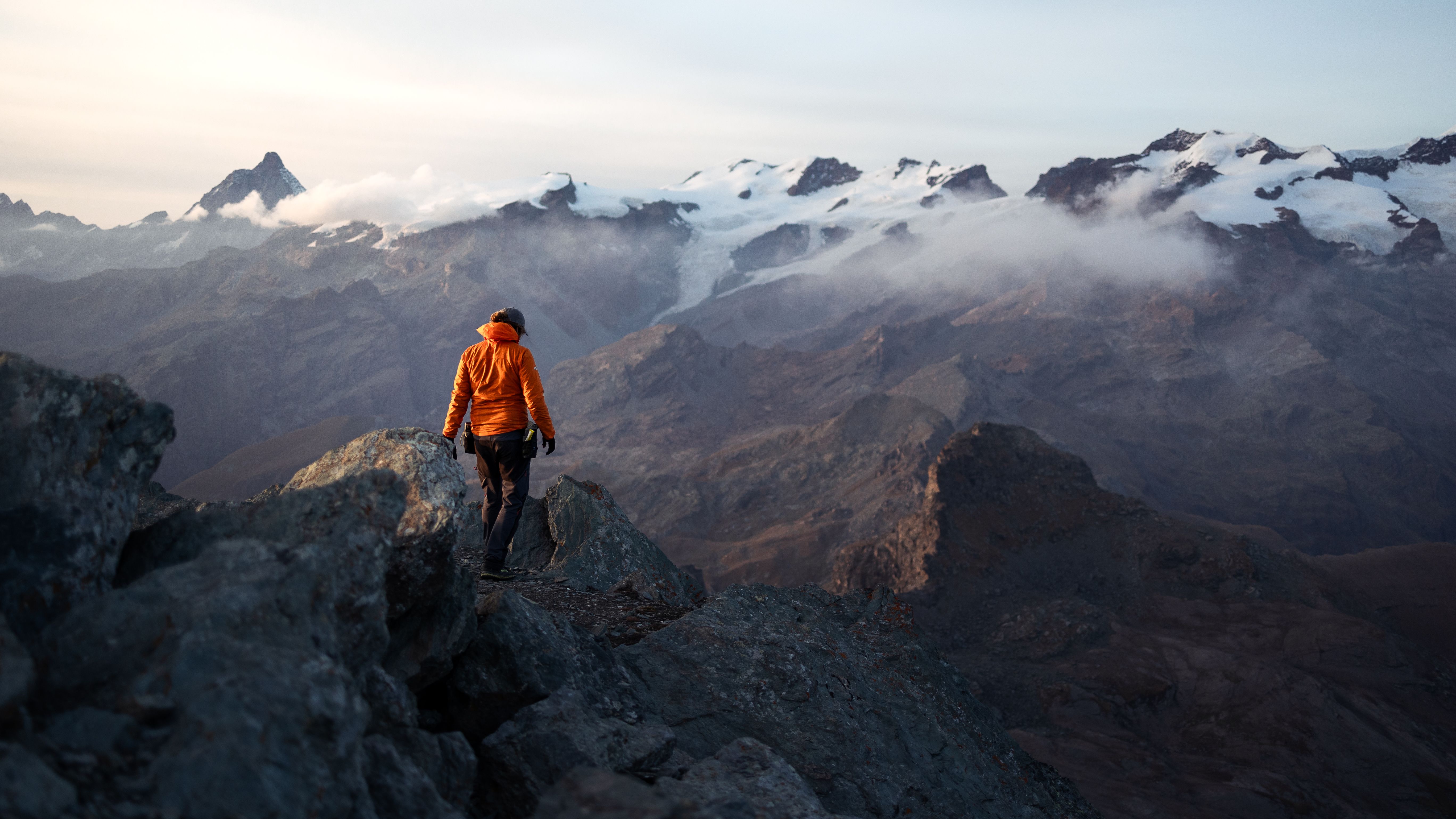 A hiker on a mountain ridge